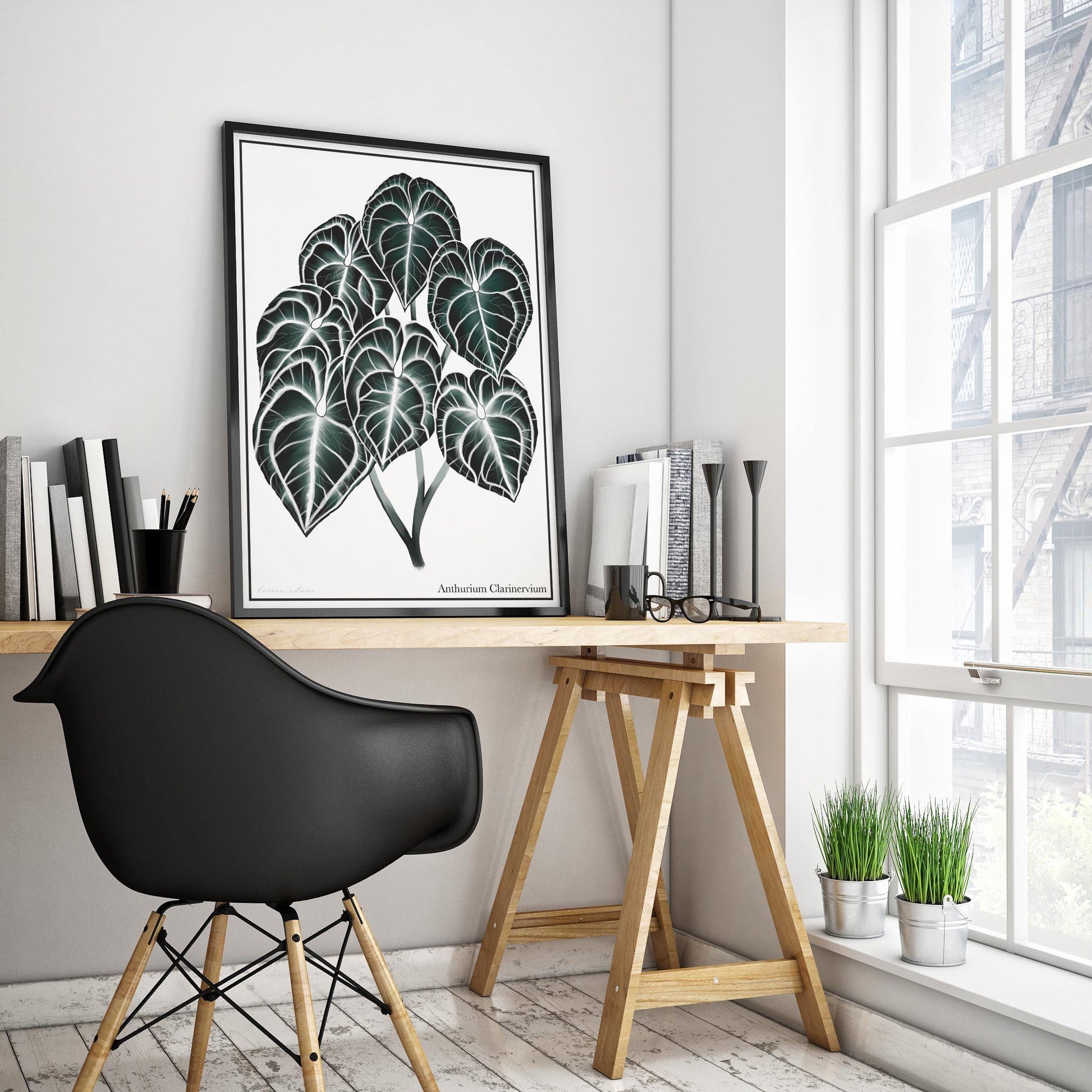 Anthurium Clarinervium artwork framed and sitting on an office desk